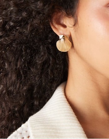 statement shell drop earrings in gold