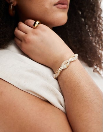 Curve bracelet with faux shell and gold bead design