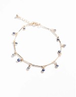 anklet with eye and fine chain design in gold tone