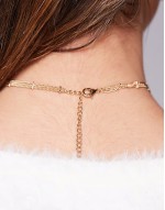 choker necklace with fine chain and dash detail in gold tone