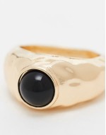 ring with molten black stone detail in gold tone