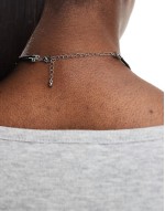 necklace with multirow molten pendant and cord design in silver tone