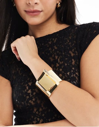 cuff bracelet with thread through detail in gold tone