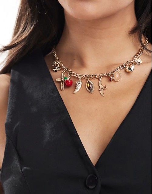 necklace with charm pendant detail in gold tone