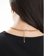 necklace with charm pendant detail in gold tone